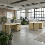 Corporate office setup featuring a cluster layout of two Full Maple rectangular desks with mobile pedestals.