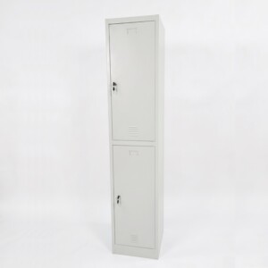 A tall, light grey two-door steel locker featuring two large vertical compartments, each with secure key locks and louvered air vents.