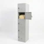 Close-up of a light grey five-tier locker with the second compartment door open, showing a neat pile of folded polo shirts stored inside to demonstrate internal shelf space and depth.