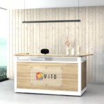Modern VITO System reception counter with 60mm Boras Ash woodgrain panel and white frame in a professional Singapore office lobby.