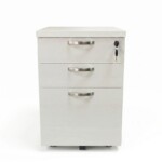 Front view of a light-toned wooden mobile pedestal with three drawers and silver handles on a white background.