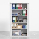 Front view of a high 1980mm light grey steel tambour office cabinet with both roller doors fully open, showing the shelves organized with numerous lever arch files, archive storage boxes, and general office supplies based on real-life usage