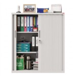 Front view of a mid height 1200mm light grey steel tambour office cabinet with both roller doors fully open, showing shelves organized with lever arch files, archive boxes, and general office supplies based on real-life usage
